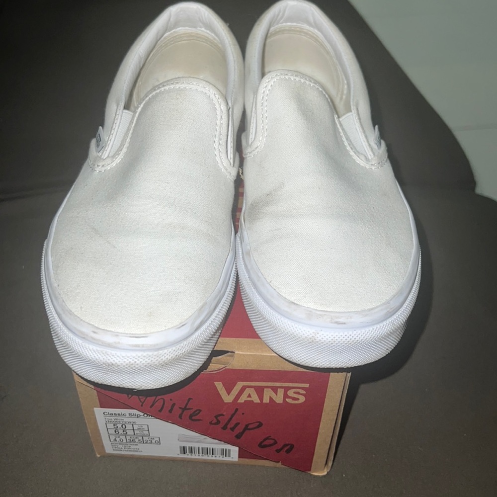 White slip on vans